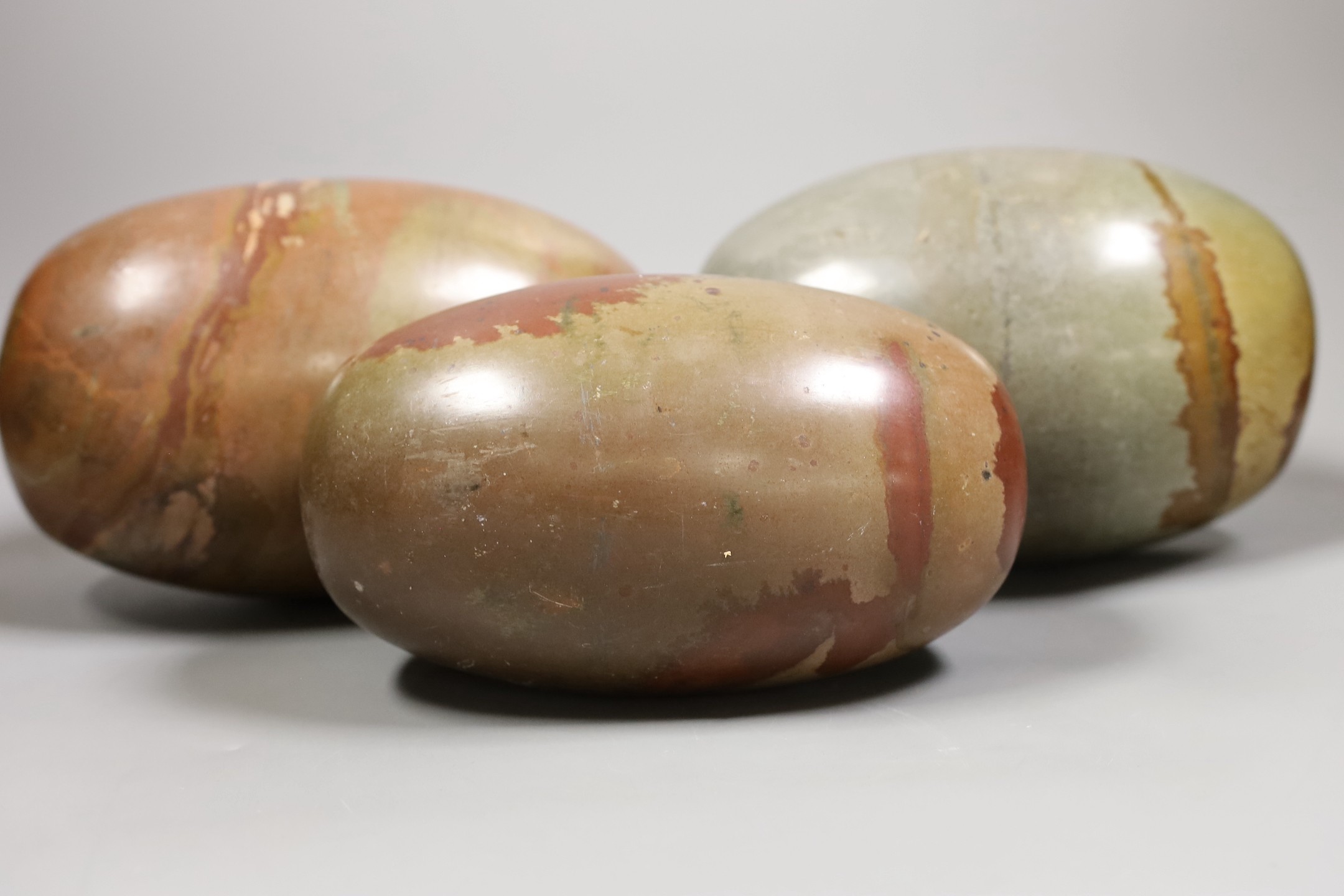 Three large polished jasper ovoid stones